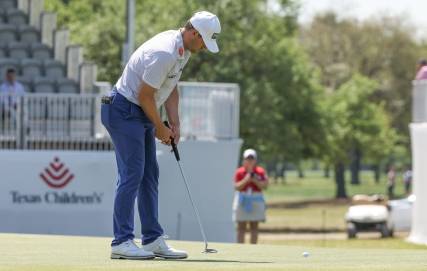Mar 28, 2024; Houston, Texas, USA; Taylor Moore (USA) sinks his putt on the 18th green during the first round of the Texas Children's Houston Open golf tournament. Mandatory Credit: Thomas Shea-USA TODAY Sports
