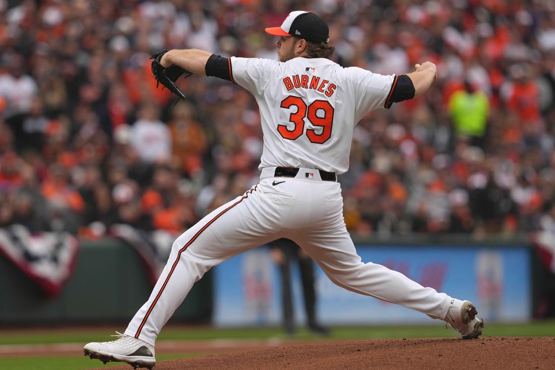 Mar 28, 2024; Baltimore, Maryland, USA; Baltimore Orioles pitcher Corbin Burnes (39) delivers in the first inning against the Los Angeles Angels at Oriole Park at Camden Yards. Mandatory Credit: Mitch Stringer-USA TODAY Sports