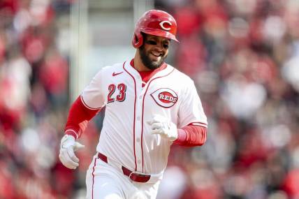 Mar 28, 2024; Cincinnati, Ohio, USA; Cincinnati Reds designated hitter Nick Martini (23) runs the bases after hitting a two-run home run in the second inning against the Washington Nationals at Great American Ball Park. Mandatory Credit: Katie Stratman-USA TODAY Sports