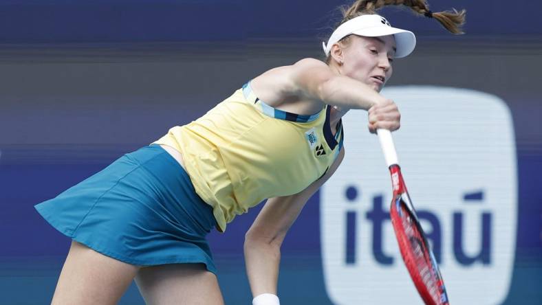 Mar 28, 2024; Miami Gardens, FL, USA; Elena Rybakina
(KAZ) serves against Victoria Azarenka (not pictured) on day eleven of the Miami Open at Hard Rock Stadium. Mandatory Credit: Geoff Burke-USA TODAY Sports