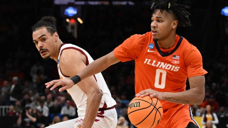 Mar 28, 2024; Boston, MA, USA; Illinois Fighting Illini guard Terrence Shannon Jr. (0) dribbles the ball against the Iowa State Cyclones in the semifinals of the East Regional of the 2024 NCAA Tournament at TD Garden. Mandatory Credit: Brian Fluharty-USA TODAY Sports