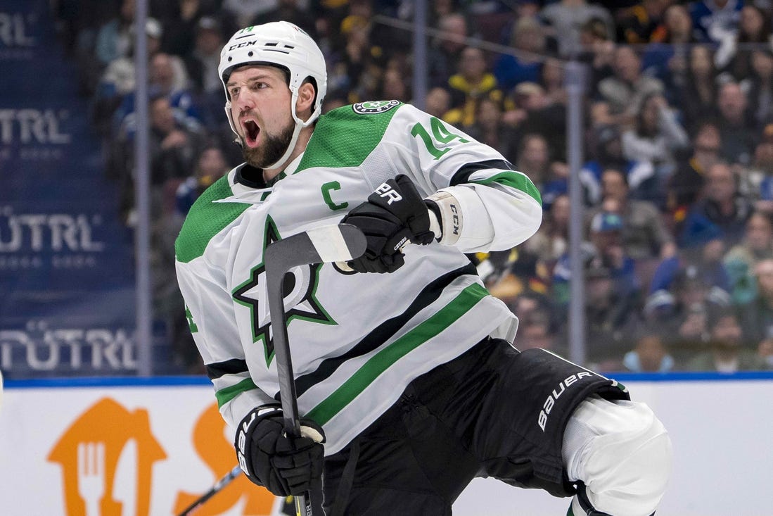 Mar 28, 2024; Vancouver, British Columbia, CAN; Dallas Stars forward Jamie Benn (14) celebrates his goal against the Vancouver Canucks in the third period at Rogers Arena. Dallas won 3 - 1. Mandatory Credit: Bob Frid-USA TODAY Sports