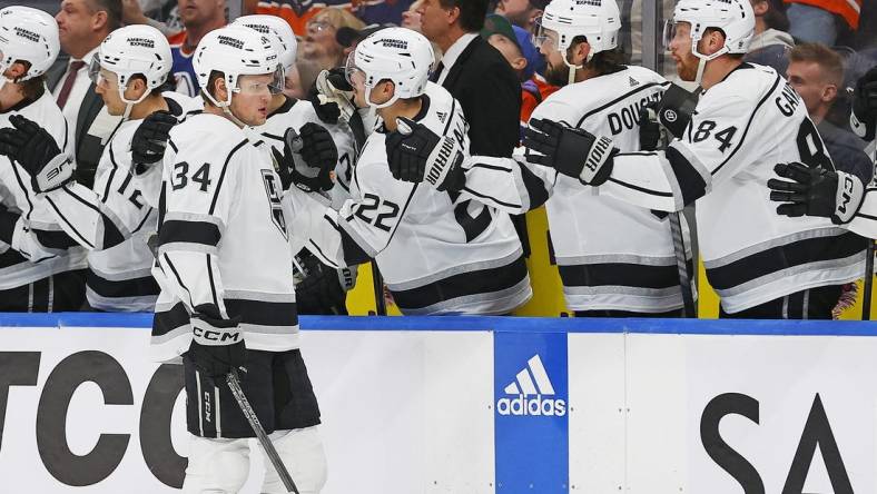 Mar 28, 2024; Edmonton, Alberta, CAN; The Los Angeles Kings celebrate a goal by forward Arthur Kaliyev (34) during the third period against the Edmonton Oilers at Rogers Place. Mandatory Credit: Perry Nelson-USA TODAY Sports