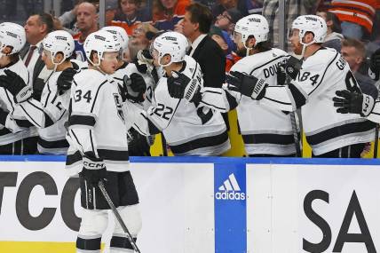 Mar 28, 2024; Edmonton, Alberta, CAN; The Los Angeles Kings celebrate a goal by forward Arthur Kaliyev (34) during the third period against the Edmonton Oilers at Rogers Place. Mandatory Credit: Perry Nelson-USA TODAY Sports