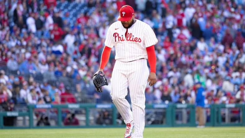 Mar 29, 2024; Philadelphia, Pennsylvania, USA; Philadelphia Phillies relief pitcher Jose Alvarado (46) walks back to the dugout after being relieved in the eighth inning against the Atlanta Braves at Citizens Bank Park. Mandatory Credit: Bill Streicher-USA TODAY Sports