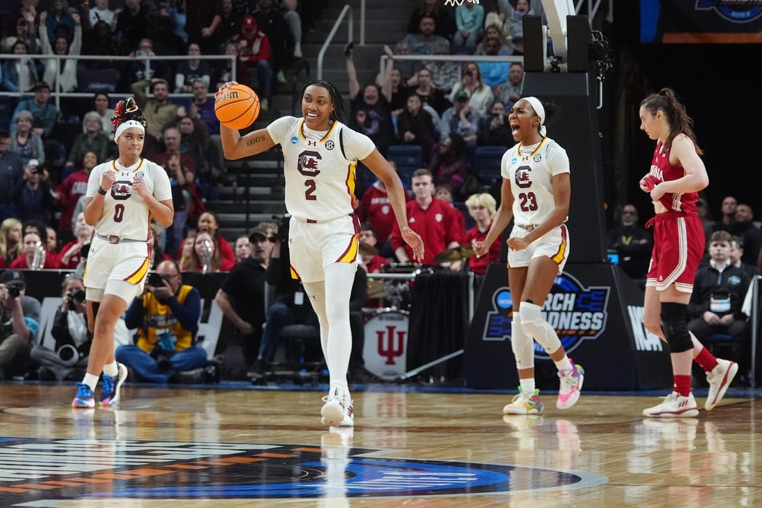 Mar 29, 2024; Albany, NY, USA; South Carolina Gamecocks forward Ashlyn Watkins (2) celebrates the victory over the Indiana Hoosiers in the semifinals of the Albany Regional of the 2024 NCAA Tournament at the MVP Arena. Mandatory Credit: Gregory Fisher-USA TODAY Sports