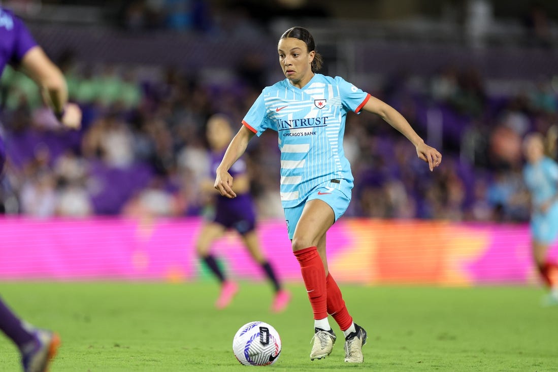 Mar 29, 2024; Orlando, Florida, USA; Chicago Red Stars forward Mallory Swanson (9) dribbles the ball during the second half against the Orlando Pride at Inter&Co Stadium. Mandatory Credit: Nathan Ray Seebeck-USA TODAY Sports