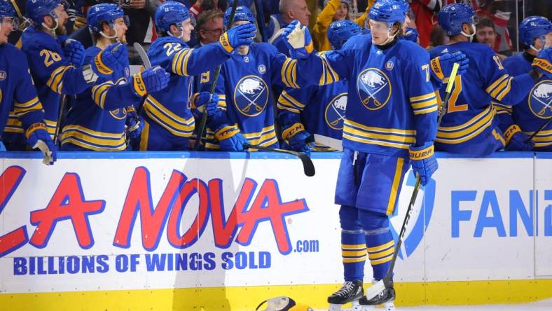 Mar 29, 2024; Buffalo, New York, USA;  Buffalo Sabres right wing Tage Thompson (72) celebrates his third goal of the game with teammates during the third period against the New Jersey Devils at KeyBank Center. Mandatory Credit: Timothy T. Ludwig-USA TODAY Sports