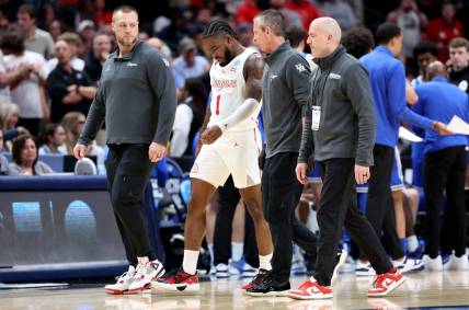 Mar 29, 2024; Dallas, TX, USA; Houston Cougars guard Jamal Shead (1) walks off the floor after an injury during the first half in the semifinals of the South Regional of the 2024 NCAA Tournament against the Duke Blue Devils at American Airlines Center. Mandatory Credit: Kevin Jairaj-USA TODAY Sports