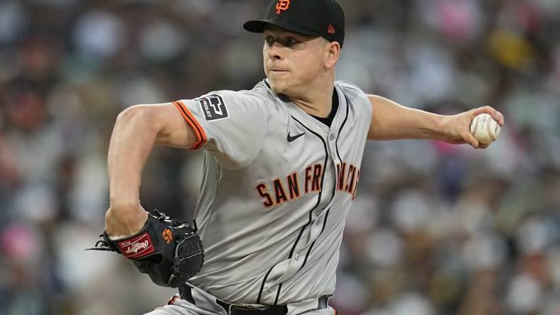 Mar 29, 2024; San Diego, California, USA; San Francisco Giants starting pitcher Kyle Harrison (45) throws a pitch against the San Diego Padres during the first inning at Petco Park. Mandatory Credit: Ray Acevedo-USA TODAY Sports