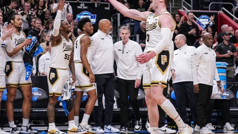 Purdue Boilermakers guard Braden Smith (3) yells in excitement to the fans on Friday, March 29, 2024, during the midwest regional semifinals at the Little Caesars Arena in Detroit. The Purdue Boilermakers defeated the Gonzaga Bulldogs, 80-68.