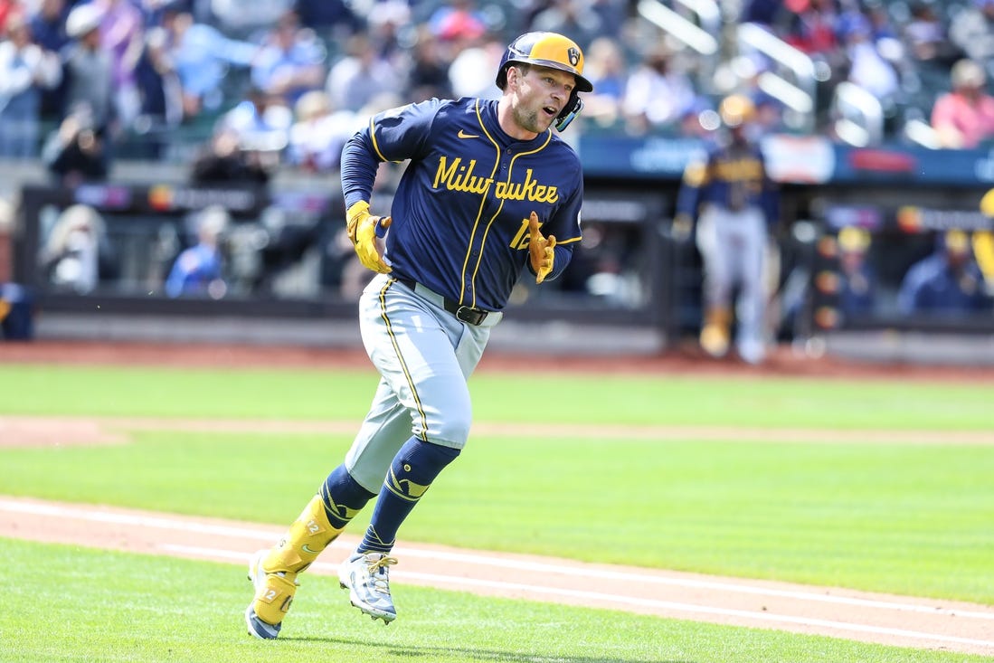 Mar 30, 2024; New York City, New York, USA;  Milwaukee Brewers designated hitter Rhys Hoskins (12) reacts after hitting a two-run home run in the third inning New York Mets at Citi Field. Mandatory Credit: Wendell Cruz-USA TODAY Sports