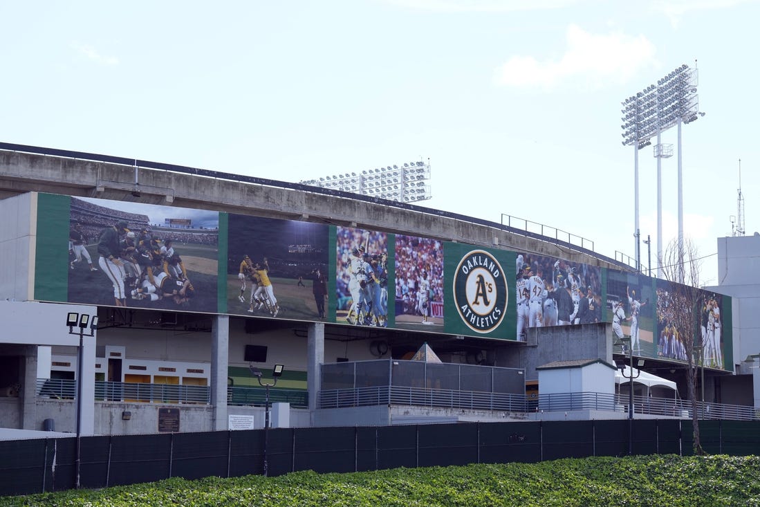 Mar 30, 2024; Oakland, California, USA; A mural on the outside of the stadium that replaced the Rooted in Oakland sign as seen before the game between the Oakland Athletics and the Cleveland Guardians at Oakland-Alameda County Coliseum. Mandatory Credit: Darren Yamashita-USA TODAY Sports
