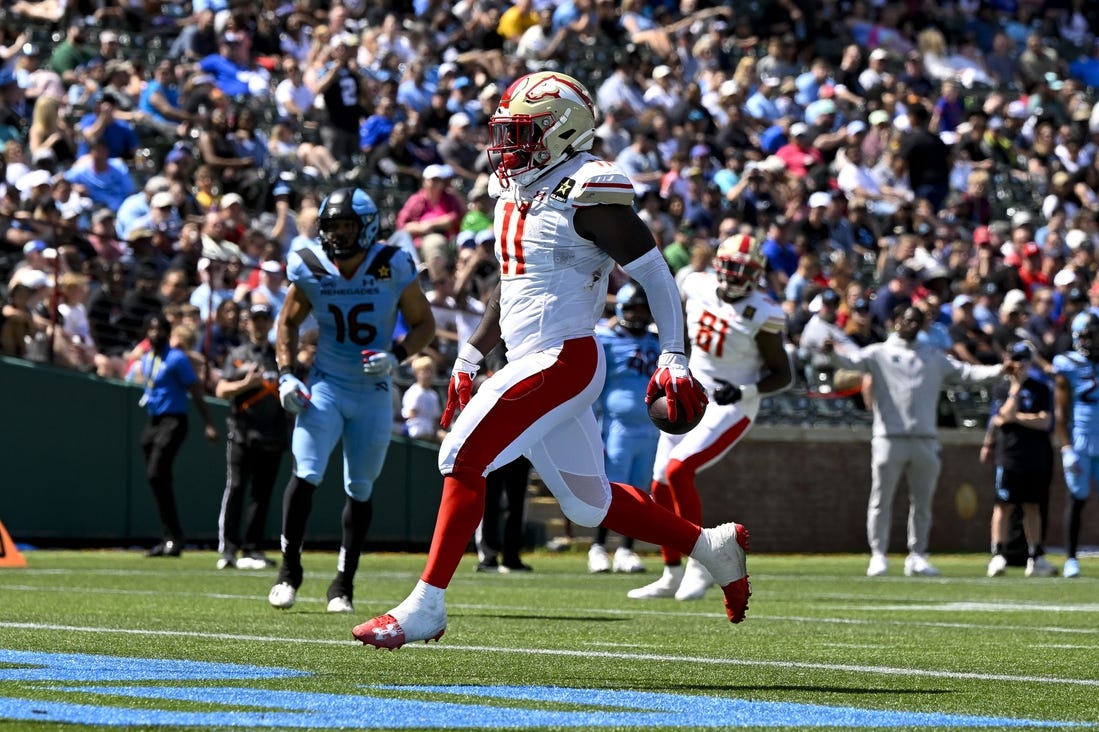 Mar 30, 2024; Arlington, TX, USA; Birmingham Stallions running back CJ Marable (11) runs for a touchdown against the Arlington Renegades during the second half at Choctaw Stadium. Mandatory Credit: Jerome Miron-USA TODAY Sports