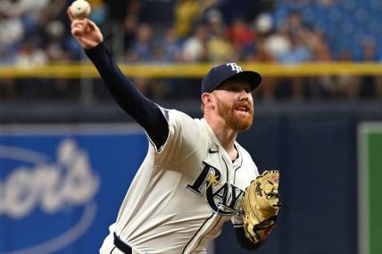Mar 30, 2024; St. Petersburg, Florida, USA; Tampa Bay Rays starting pitcher Zack Littell (52) throws a pitch in the first inning of the game against the Toronto Blue Jays   at Tropicana Field. Mandatory Credit: Jonathan Dyer-USA TODAY Sports