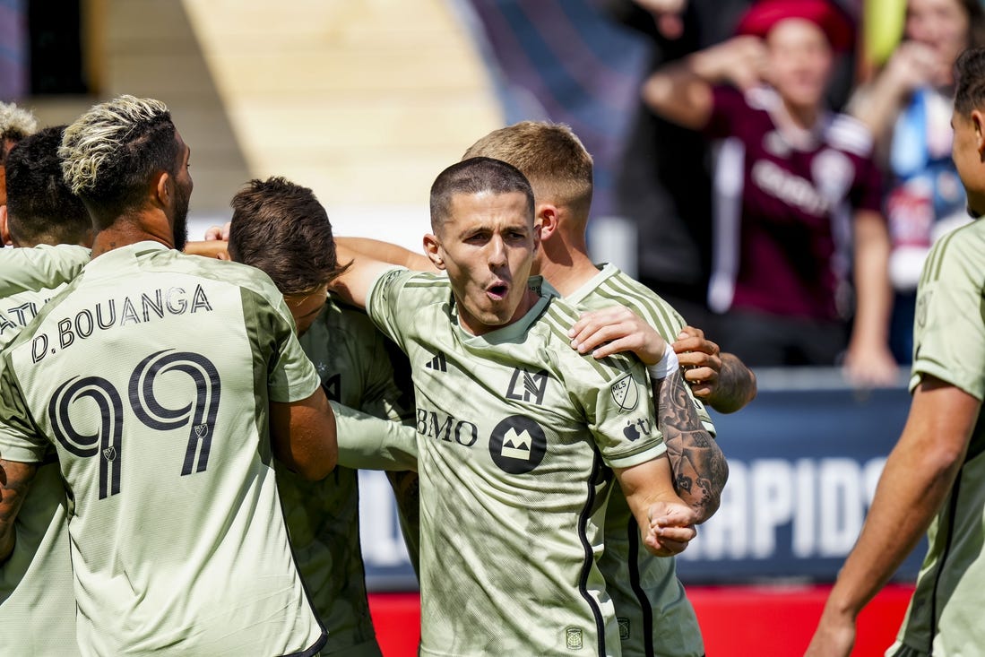 Mar 30, 2024; Commerce City, Colorado, USA; LAFC midfielder Eduard Atuesta (20) celebrates scoring a goal during the first half at Dick's Sporting Goods Park. Mandatory Credit: Ron Chenoy-USA TODAY Sports