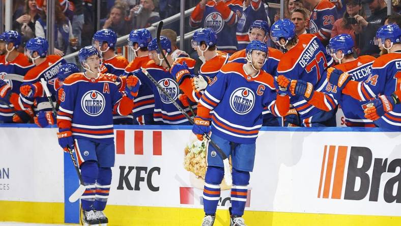 Mar 30, 2024; Edmonton, Alberta, CAN; The Edmonton Oilers celebrate a goal scored by forward Connor McDavid (97) during the second period against the Anaheim Ducks at Rogers Place. Mandatory Credit: Perry Nelson-USA TODAY Sports