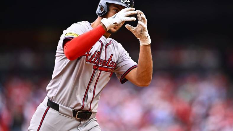 Mar 30, 2024; Philadelphia, Pennsylvania, USA; Atlanta Braves first baseman Matt Olson (28) gestures as he rounds the bases after hitting a home run against the Philadelphia Phillies in the third inning at Citizens Bank Park. Mandatory Credit: Kyle Ross-USA TODAY Sports