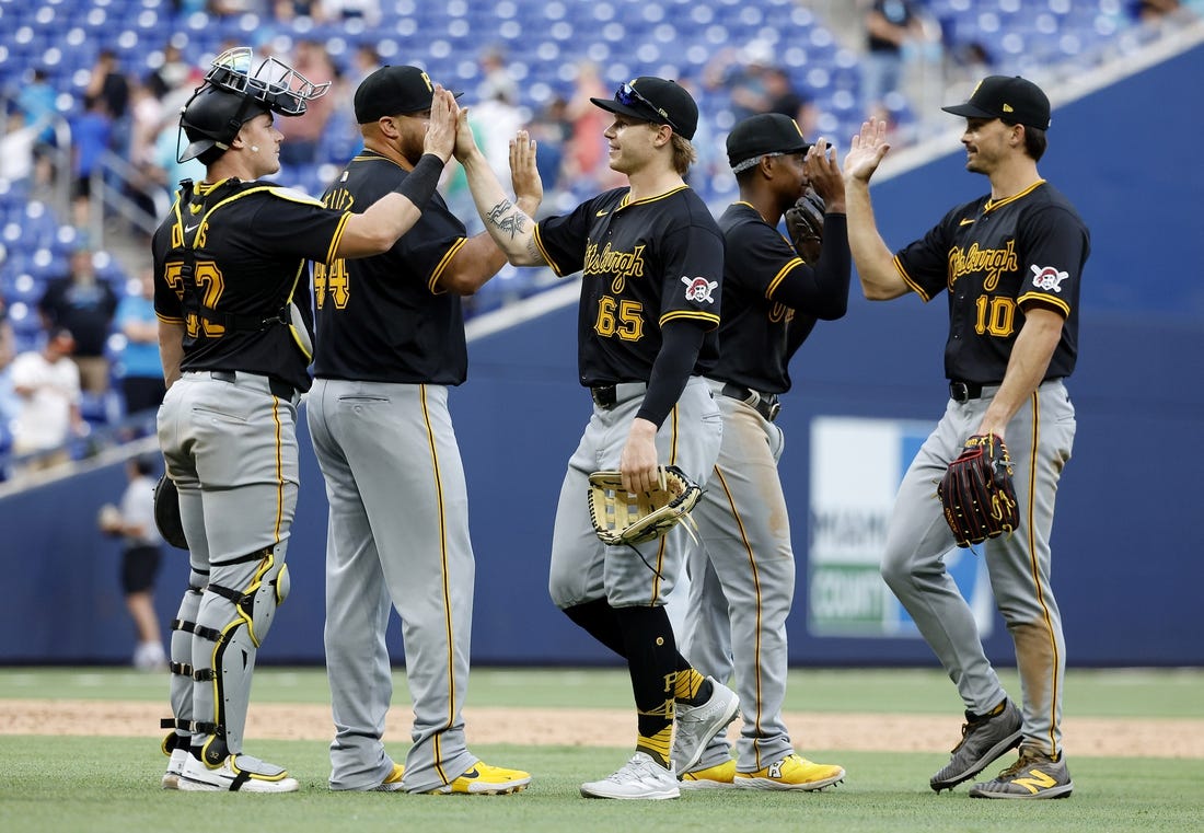 Mar 30, 2024; Miami, Florida, USA; The Pittsburgh Pirates celebrate after defeating the Miami Marlins following the game at loanDepot Park. Mandatory Credit: Rhona Wise-USA TODAY Sports