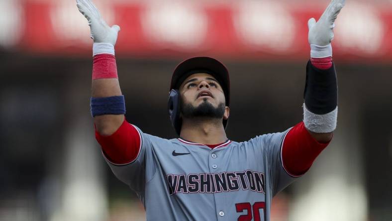 Mar 30, 2024; Cincinnati, Ohio, USA; Washington Nationals catcher Keibert Ruiz (20) reacts after hitting a solo home run in the eighth inning against the Cincinnati Reds at Great American Ball Park. Mandatory Credit: Katie Stratman-USA TODAY Sports