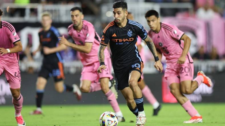 Mar 30, 2024; Fort Lauderdale, Florida, USA; New York City FC forward Santiago Rodriguez (10) dribbles against Inter Miami CF during the first half at Chase Stadium. Mandatory Credit: Nathan Ray Seebeck-USA TODAY Sports