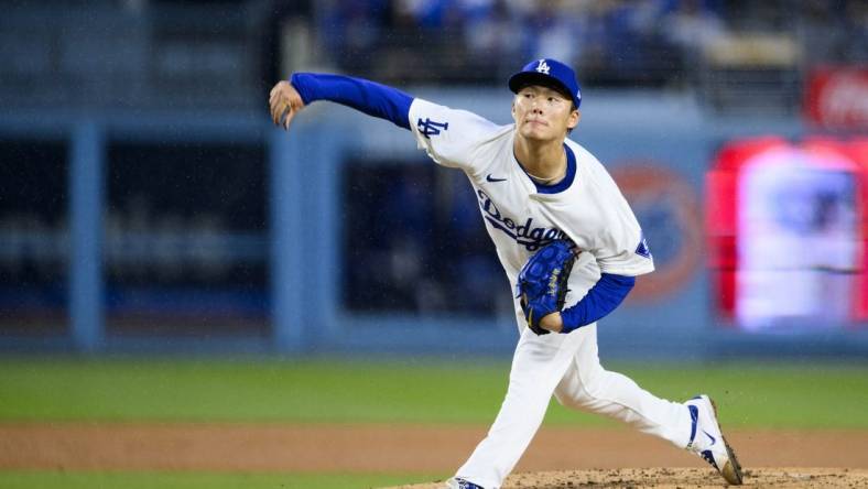 Mar 30, 2024; Los Angeles, California, USA; Los Angeles Dodgers starting pitcher Yoshinobu Yamamoto (18) throws out a pitch during the fourth inning against the St. Louis Cardinals at Dodger Stadium. Mandatory Credit: Kelvin Kuo-USA TODAY Sports