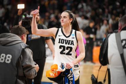 Iowa Hawkeyes guard Caitlin Clark (22) gives a thumbs up to the crowd after the Sweet 16 round of the NCAA Women's Basketball Tournament at MVP Arena, Saturday, March 30, 2024 in Albany, N.Y.