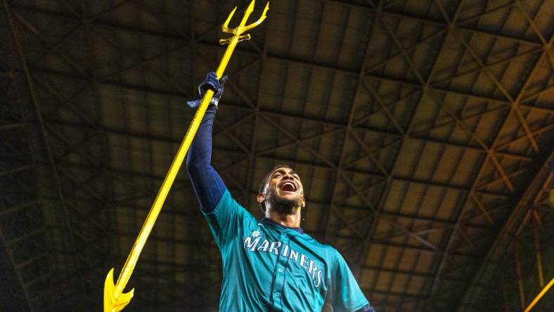 Mar 30, 2024; Seattle, Washington, USA; Seattle Mariners center fielder Julio Rodriguez (44) celebrates after hitting a walk-off RBI-single against the Boston Red Sox during the tenth inning at T-Mobile Park. Mandatory Credit: Joe Nicholson-USA TODAY Sports