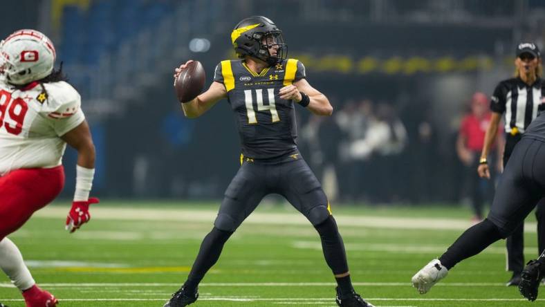 Mar 31, 2024; San Antonio, TX, USA;  San Antonio Brahmas quarterback Chase Garbers (14) throws a pass in the first half against the DC Defenders at The Alamodome. Mandatory Credit: Daniel Dunn-USA TODAY Sports