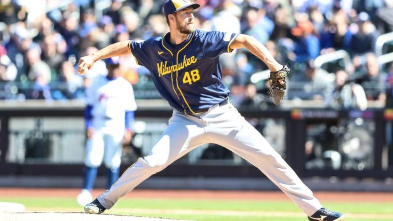 Mar 31, 2024; New York City, New York, USA;  Milwaukee Brewers starting pitcher Colin Rea (48) pitches in the first inning against the New York Mets at Citi Field. Mandatory Credit: Wendell Cruz-USA TODAY Sports