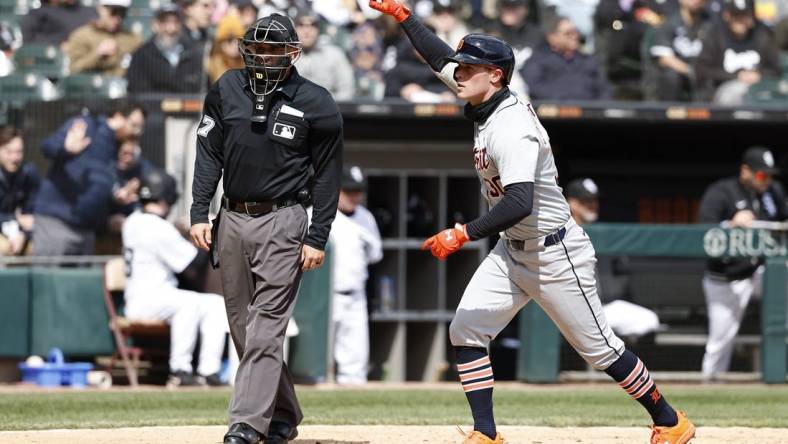 Mar 31, 2024; Chicago, Illinois, USA; Detroit Tigers right fielder Kerry Carpenter (30) crosses home plate after hitting a solo home run against the Chicago White Sox during the fourth inning at Guaranteed Rate Field. Mandatory Credit: Kamil Krzaczynski-USA TODAY Sports