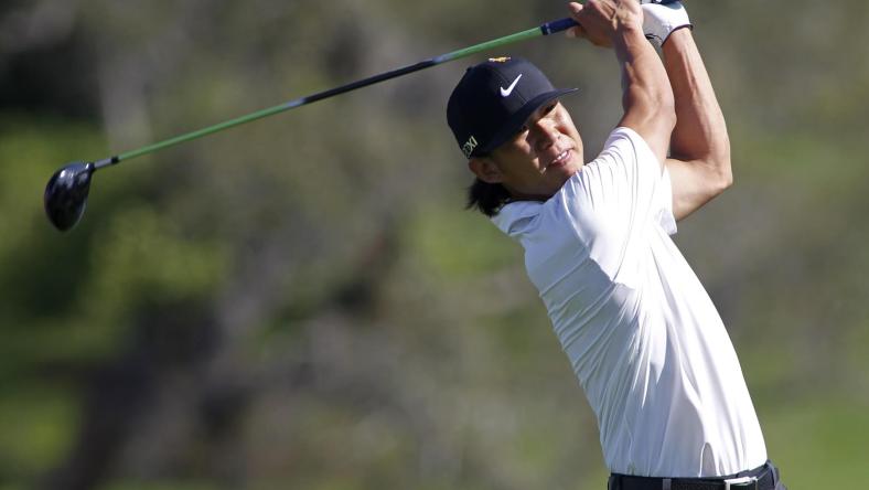 Anthony Kim of the U.S. watches his tee shot on the 16th hole during first round play in the Arnold Palmer Invitational PGA golf tournament in Orlando, Florida, March 22, 2012.