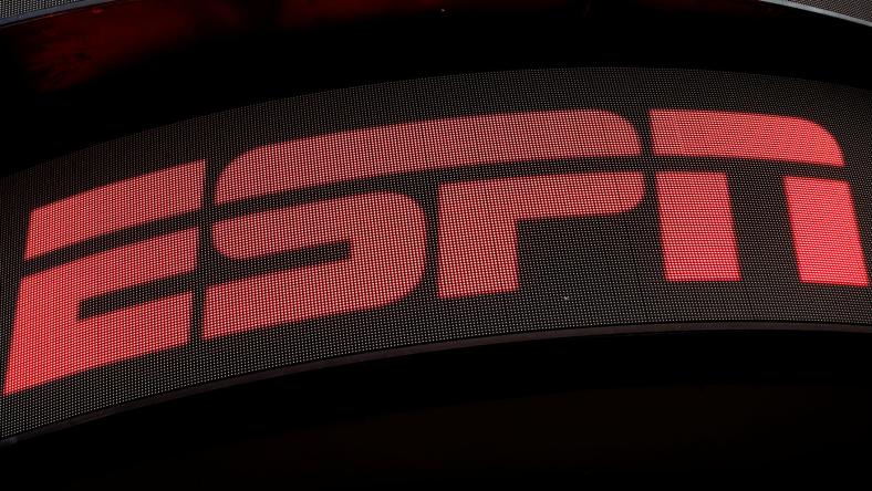 The ESPN logo is seen on an electronic display in Times Square in New York on Aug. 23, 2017.