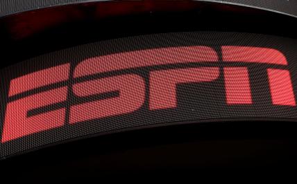 The ESPN logo is seen on an electronic display in Times Square in New York on Aug. 23, 2017.