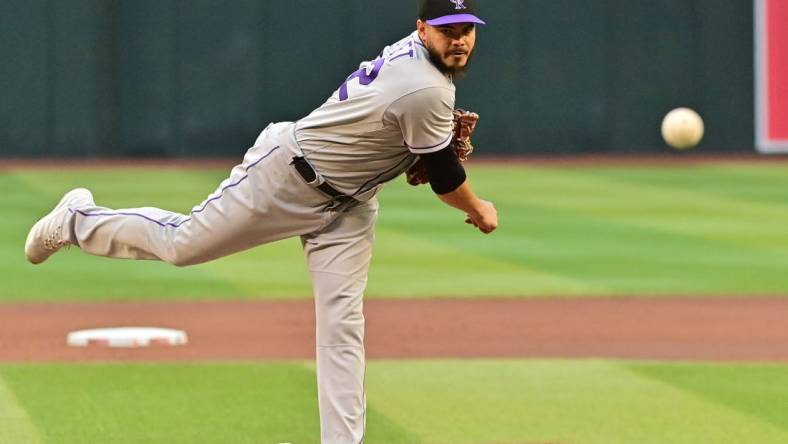 May 31, 2023; Phoenix, Arizona, USA;  Colorado Rockies starting pitcher Dinelson Lamet (32) throws in the first inning against the Arizona Diamondbacks at Chase Field. Mandatory Credit: Matt Kartozian-USA TODAY Sports