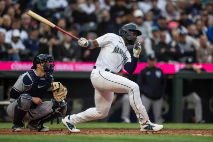 May 31, 2023; Seattle, Washington, USA; Seattle Mariners designated hitter Taylor Trammell (5) takes a swing during an at-bat against the New York Yankees at T-Mobile Park. Mandatory Credit: Stephen Brashear-USA TODAY Sports