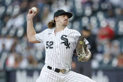 Sep 30, 2023; Chicago, Illinois, USA; Chicago White Sox starting pitcher Mike Clevinger (52) delivers a pitch against the San Diego Padres during the first inning at Guaranteed Rate Field. Mandatory Credit: Kamil Krzaczynski-USA TODAY Sports
