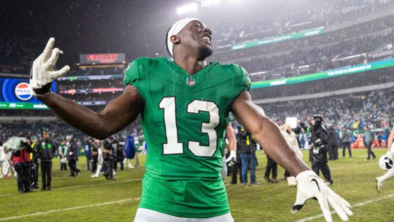 Nov 26, 2023; Philadelphia, Pennsylvania, USA; Philadelphia Eagles wide receiver Olamide Zaccheaus (13) reacts after a victory against the Buffalo Bills at Lincoln Financial Field. Mandatory Credit: Bill Streicher-USA TODAY Sports