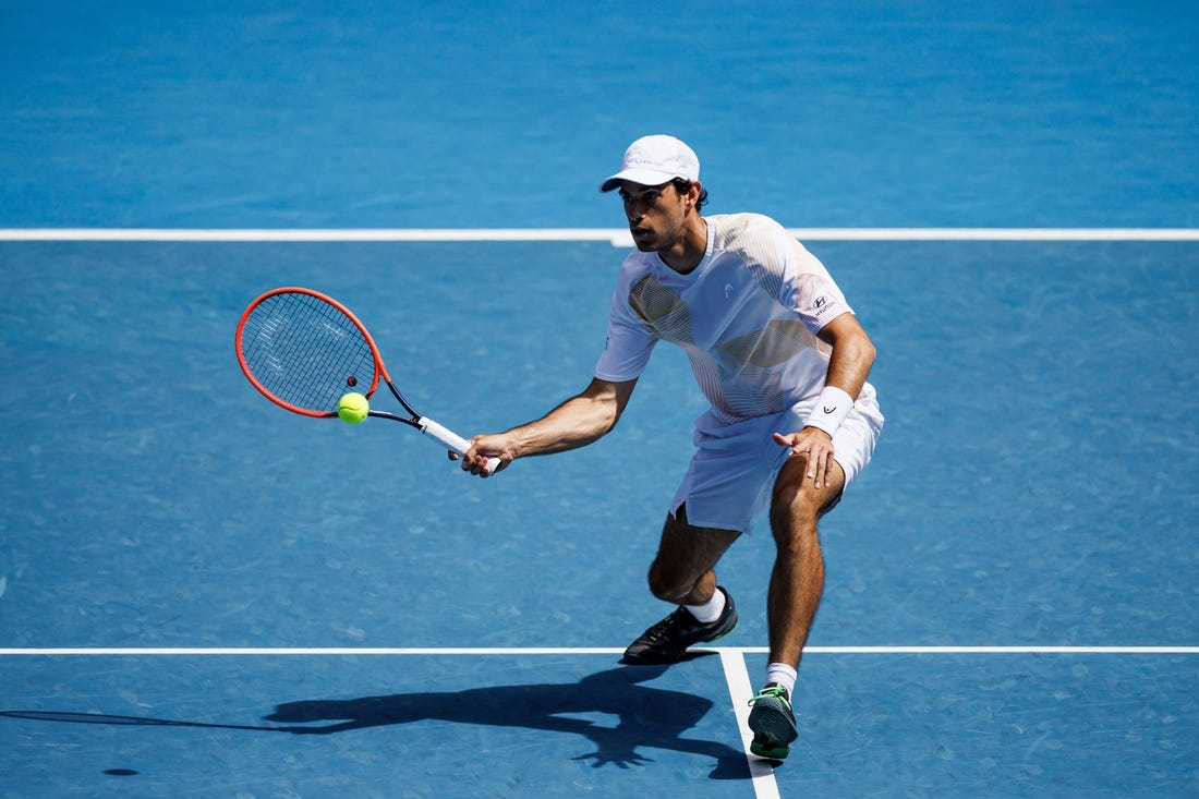 Jan 22, 2024; Melbourne, Victoria, Australia; 
Nuno Borges of Portugal hits a shot against Daniil Medvedev of Russia in the fourth round of the men   s singles at the Australian Open in Melbourne
Mandatory Credit: Mike Frey-USA TODAY Sports