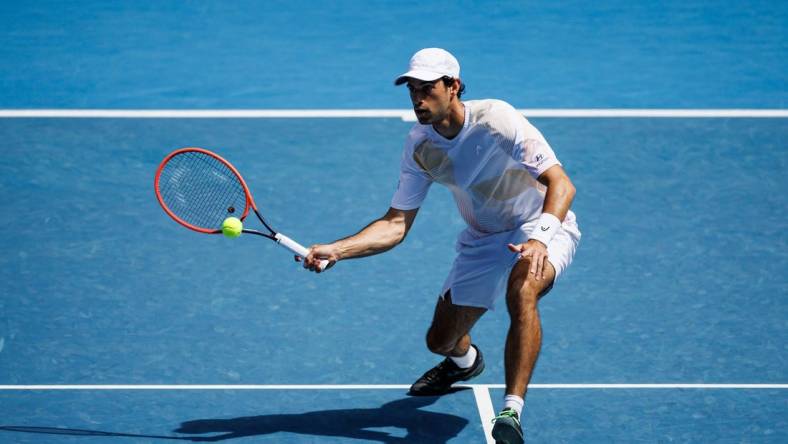 Jan 22, 2024; Melbourne, Victoria, Australia; 
Nuno Borges of Portugal hits a shot against Daniil Medvedev of Russia in the fourth round of the men   s singles at the Australian Open in Melbourne
Mandatory Credit: Mike Frey-USA TODAY Sports