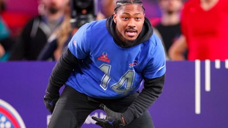 Feb 1, 2024; Orlando, FL, USA;  Buffalo Bills wide receiver Stefon Diggs (14) participates in the NFL Pro Bowl Skills Competition at the UCF NIcholson Fieldhouse. Mandatory Credit: Nathan Ray Seebeck-USA TODAY Sports