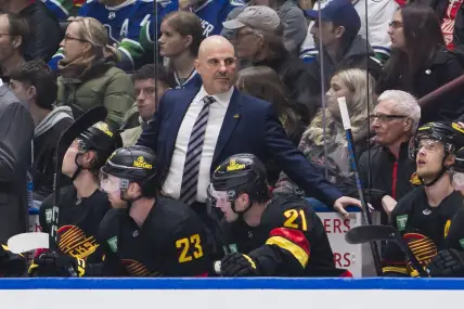 Feb 15, 2024; Vancouver, British Columbia, CAN; Vancouver Canucks head coach Rick Tocchet on the bench against the Detroit Red Wings in the first period at Rogers Arena. Mandatory Credit: Bob Frid-USA TODAY Sports