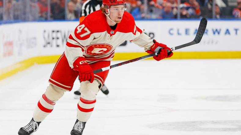 Feb 24, 2024; Edmonton, Alberta, CAN; Calgary Flames forward Connor Zary (47) against the Edmonton Oilers at Rogers Place. Mandatory Credit: Perry Nelson-USA TODAY Sports