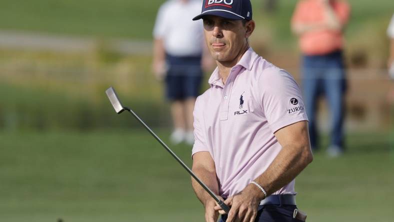 Feb 29, 2024; Palm Beach Gardens, Florida, USA; Billy Horschel watches his putt roll on the 16th green during the first round of the Cognizant Classic in The Palm Beaches golf tournament. Mandatory Credit: Reinhold Matay-USA TODAY Sports