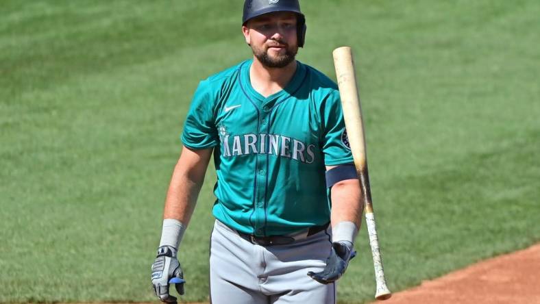 Mar 8, 2024; Mesa, Arizona, USA;  Seattle Mariners catcher Cal Raleigh (29) reacts after striking out in the second inning against the Chicago Cubs during a spring training game at Sloan Park. Mandatory Credit: Matt Kartozian-USA TODAY Sports