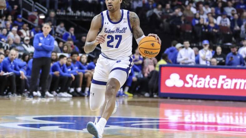 Mar 9, 2024; Newark, New Jersey, USA;  Seton Hall Pirates guard Dre Davis (27) brings the ball up court in the second half against the DePaul Blue Demons at Prudential Center. Mandatory Credit: Wendell Cruz-USA TODAY Sports