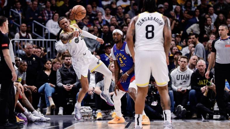 Mar 9, 2024; Denver, Colorado, USA; Utah Jazz guard Keyonte George (3) passes the ball to forward Brice Sensabaugh (8) as Denver Nuggets guard Kentavious Caldwell-Pope (5) defends in the third quarter at Ball Arena. Mandatory Credit: Isaiah J. Downing-USA TODAY Sports