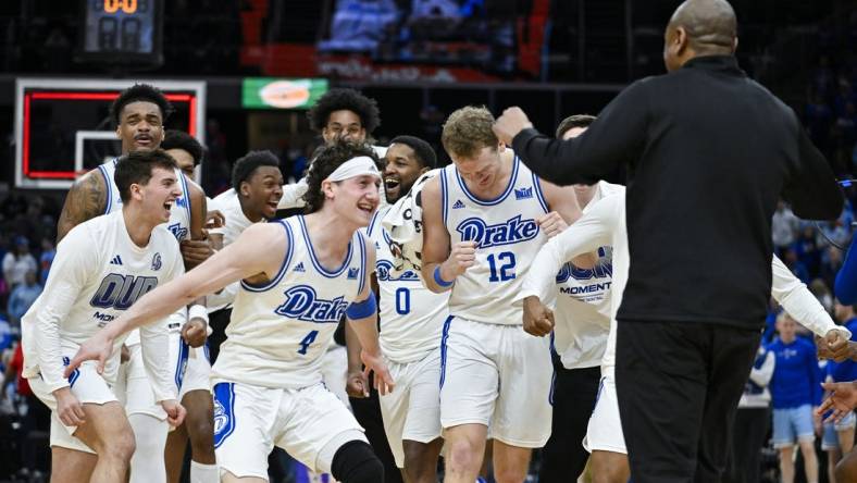 Mar 10, 2024; St. Louis, MO, USA;  Drake Bulldogs celebrate after defeating the Indiana State Sycamores to win the Missouri Valley Conference Tournament Championship at Enterprise Center. Mandatory Credit: Jeff Curry-USA TODAY Sports