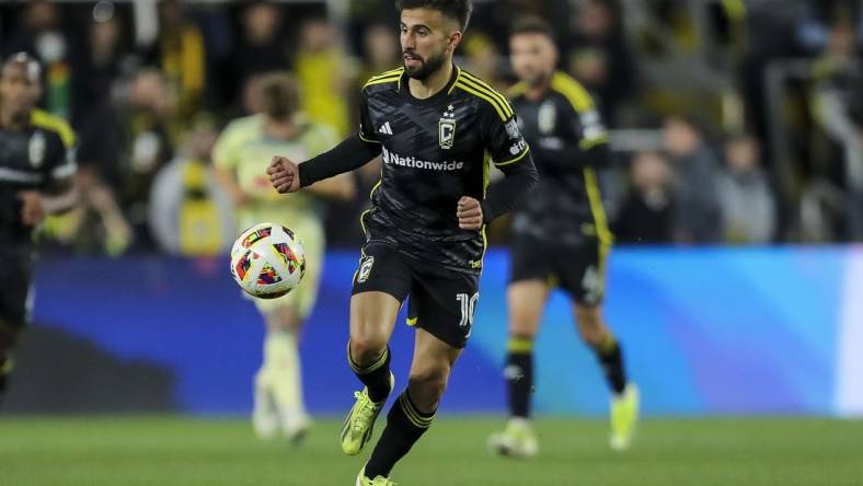 Mar 16, 2024; Columbus, Ohio, USA; Columbus Crew forward Diego Rossi (10) dribbles against the New York Red Bulls in the second half at Lower.com Field. Mandatory Credit: Katie Stratman-USA TODAY Sports