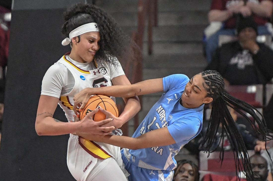 Mar 24, 2034; Columbia, So Carolina, USA;  South Carolina center Kamilla Cardoso (10) and University of North Carolina guard Teonni Key (13) try to get a rebound during the second quarter of the second round NCAA Women's Basketball Tournament game at the Colonial Life Center.  Mandatory Credit: Ken Ruinard-USA TODAY Sports via Greenville News
